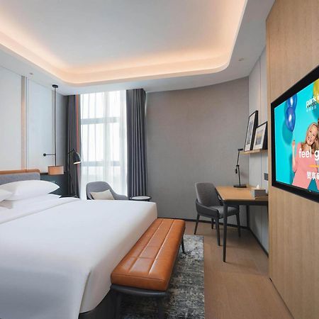 Park Inn By Radisson Nanchong Yilong Star City Plaza Zewnętrze zdjęcie