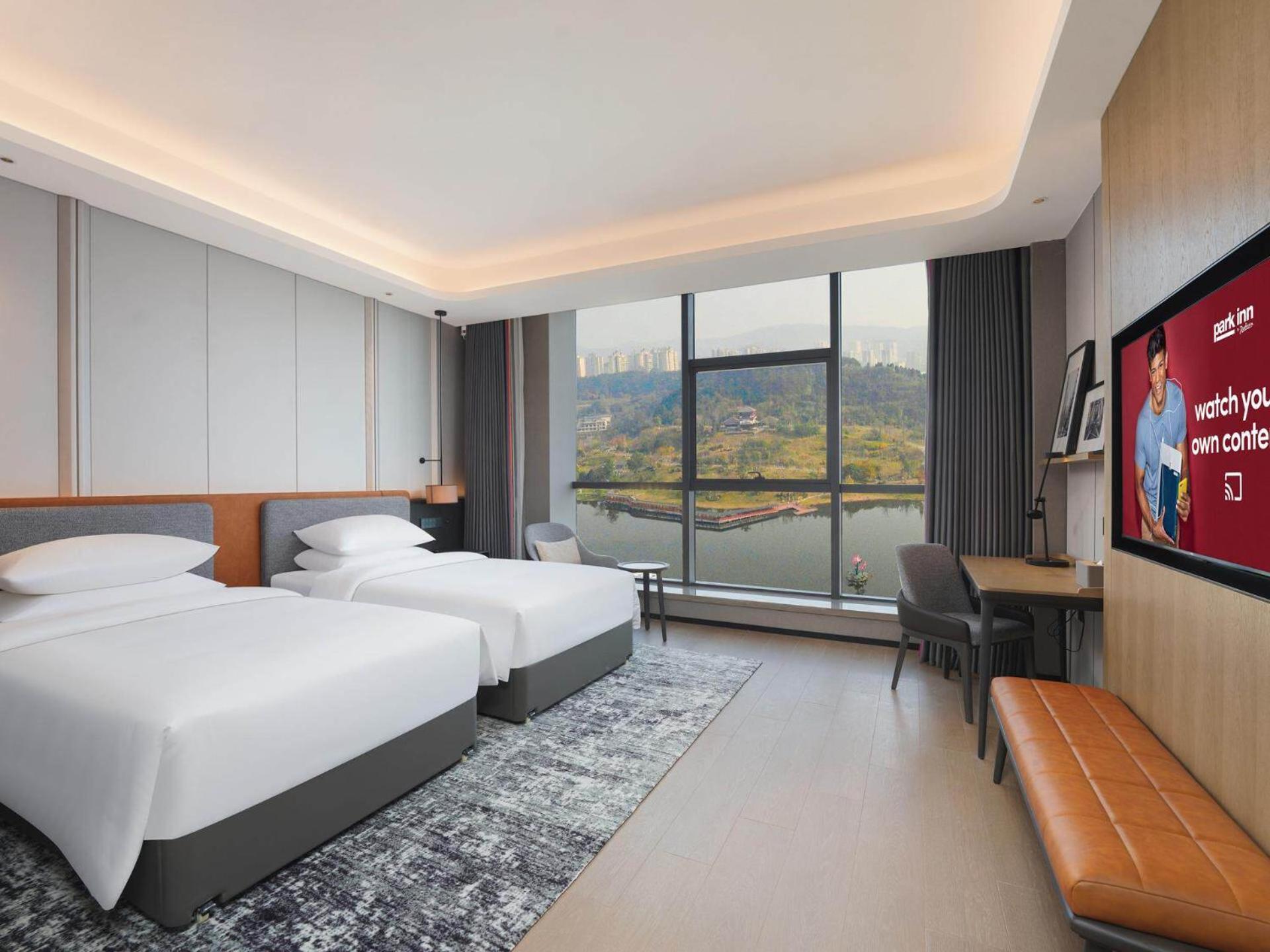 Park Inn By Radisson Nanchong Yilong Star City Plaza Zewnętrze zdjęcie