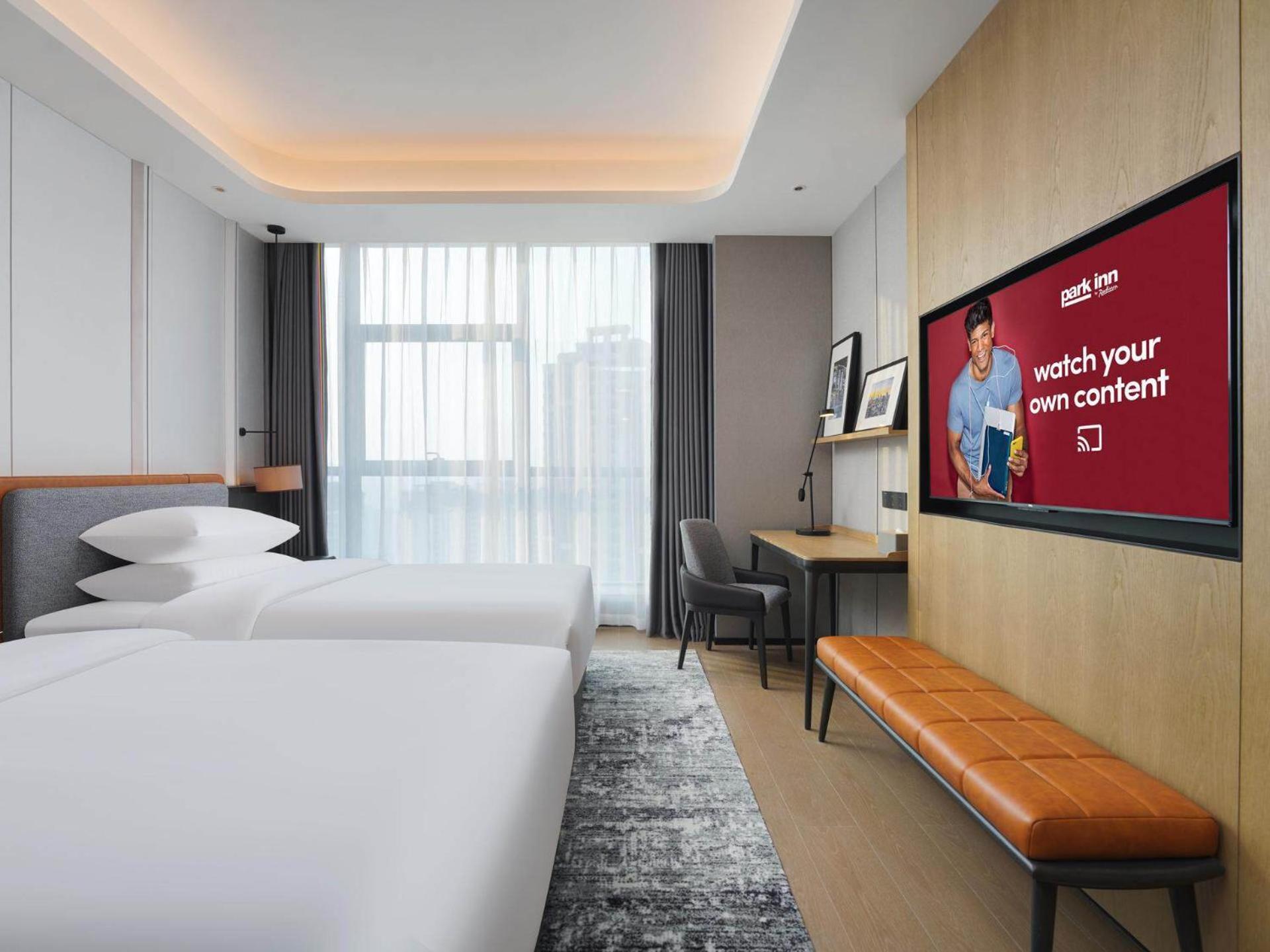 Park Inn By Radisson Nanchong Yilong Star City Plaza Zewnętrze zdjęcie
